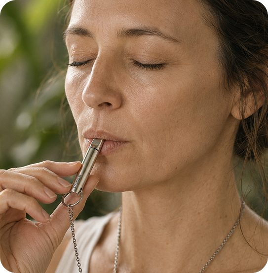 Woman using the Cessa breathe pendant
